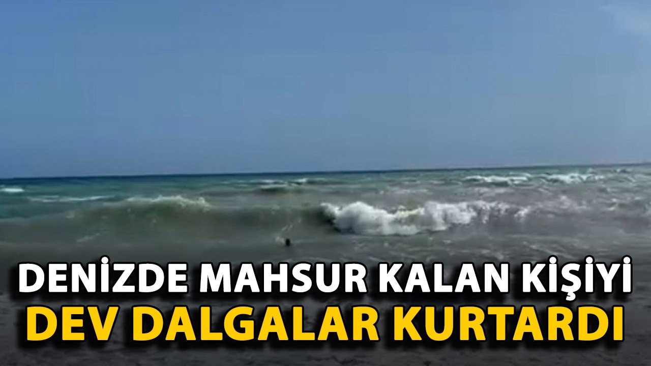 Antalya'da denizde mahsur kalan kişiyi dev dalgalar kurtardı